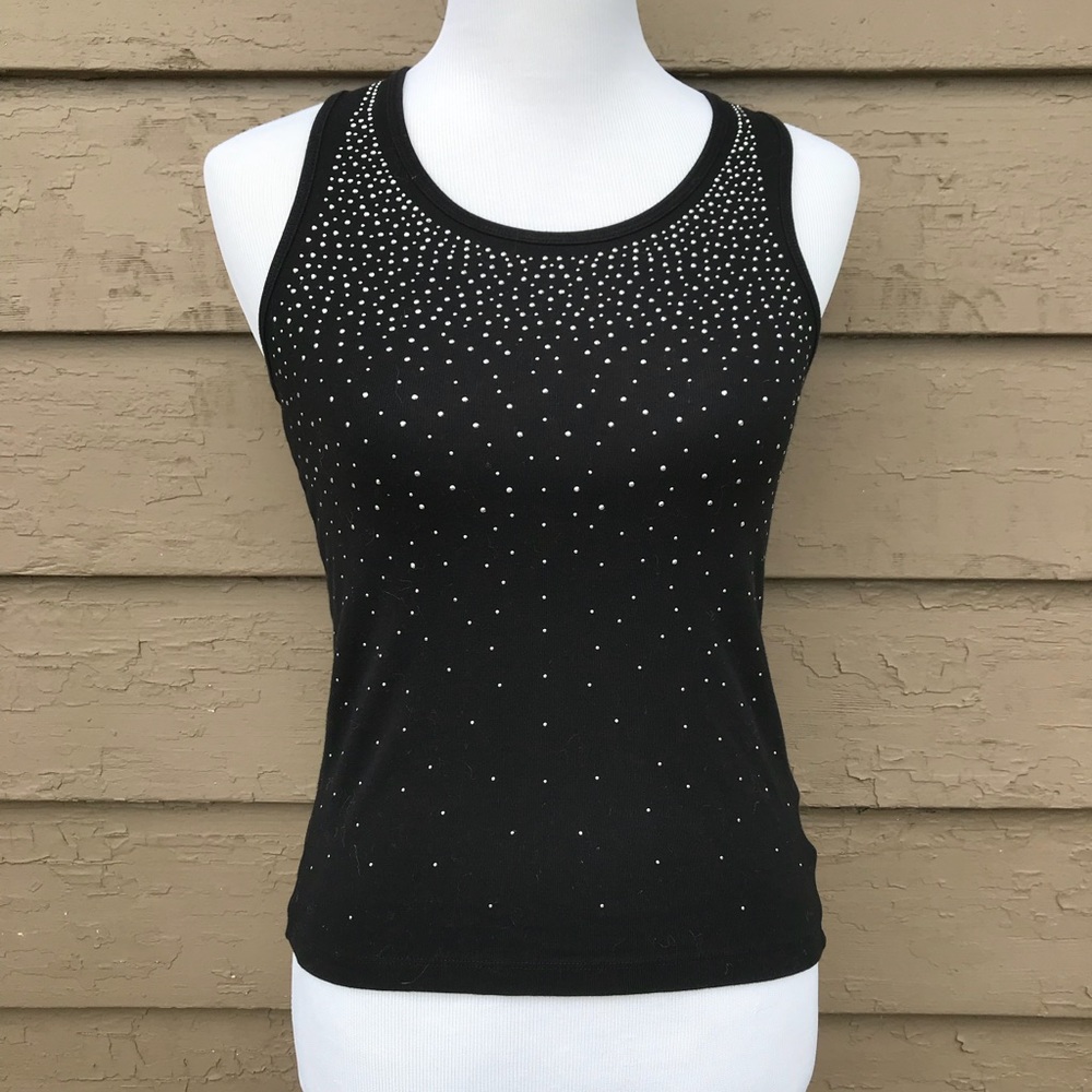 A black tank top with sparkles covering it